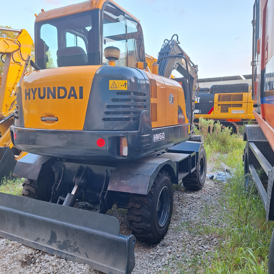 Hyundai 60vs  excavator - Bager na kotačima: slika  Hyundai 60vs  excavator - Bager na kotačima Hyundai 60vs  excavator - Bager na kotačima: slika  Hyundai 60vs  excavator - Bager na kotačima