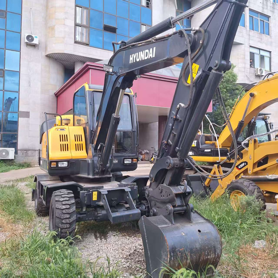 Hyundai HW60  excavator - Bager na kotačima: slika  Hyundai HW60  excavator - Bager na kotačima Hyundai HW60  excavator - Bager na kotačima: slika  Hyundai HW60  excavator - Bager na kotačima