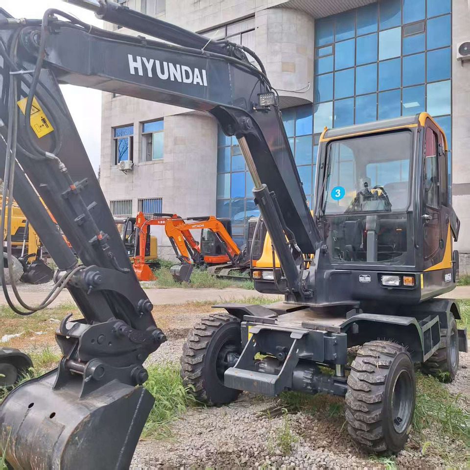 Hyundai HW60  excavator - Bager na kotačima: slika  Hyundai HW60  excavator - Bager na kotačima Hyundai HW60  excavator - Bager na kotačima: slika  Hyundai HW60  excavator - Bager na kotačima