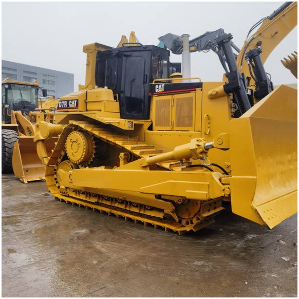 Second Hand Caterpillar CAT D7G D7R Bulldozer Used CAT D7R in stock in shanghai yard - Buldožer: slika Second Hand Caterpillar CAT D7G D7R Bulldozer Used CAT D7R in stock in shanghai yard - Buldožer Second Hand Caterpillar CAT D7G D7R Bulldozer Used CAT D7R in stock in shanghai yard - Buldožer: slika Second Hand Caterpillar CAT D7G D7R Bulldozer Used CAT D7R in stock in shanghai yard - Buldožer