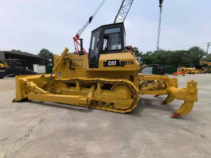Second Hand Original Caterpillar Bulldozer D7 Used CAT D7G Dozer on Hot Sale in China - Buldožer: slika Second Hand Original Caterpillar Bulldozer D7 Used CAT D7G Dozer on Hot Sale in China - Buldožer Second Hand Original Caterpillar Bulldozer D7 Used CAT D7G Dozer on Hot Sale in China - Buldožer: slika Second Hand Original Caterpillar Bulldozer D7 Used CAT D7G Dozer on Hot Sale in China - Buldožer