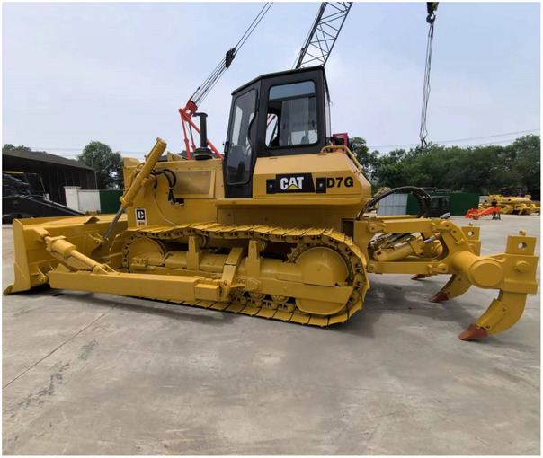 Second Hand Original Caterpillar Bulldozer D7 Used CAT D7G Dozer on Hot Sale in China - Buldožer: slika Second Hand Original Caterpillar Bulldozer D7 Used CAT D7G Dozer on Hot Sale in China - Buldožer Second Hand Original Caterpillar Bulldozer D7 Used CAT D7G Dozer on Hot Sale in China - Buldožer: slika Second Hand Original Caterpillar Bulldozer D7 Used CAT D7G Dozer on Hot Sale in China - Buldožer