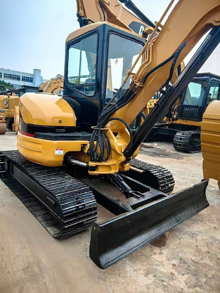 CAT 304 - Mini bager: slika CAT 304 - Mini bager CAT 304 - Mini bager: slika CAT 304 - Mini bager
