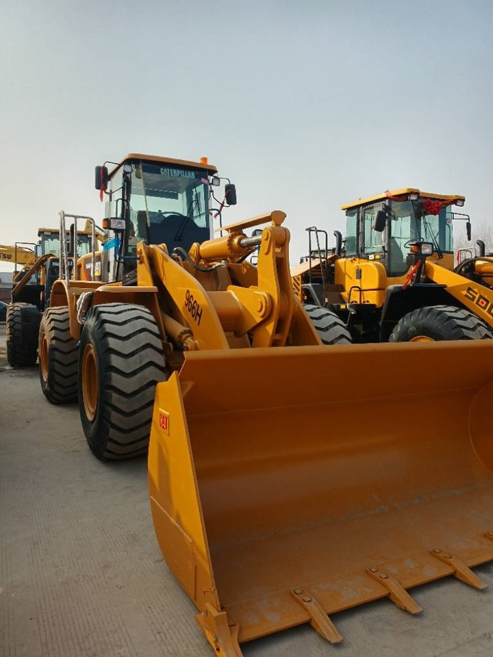 CAT 966 H - Utovarivač na kotačima: slika CAT 966 H - Utovarivač na kotačima CAT 966 H - Utovarivač na kotačima: slika CAT 966 H - Utovarivač na kotačima