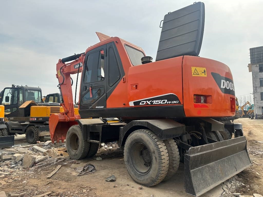 Doosan 150 - Bager na kotačima: slika Doosan 150 - Bager na kotačima Doosan 150 - Bager na kotačima: slika Doosan 150 - Bager na kotačima