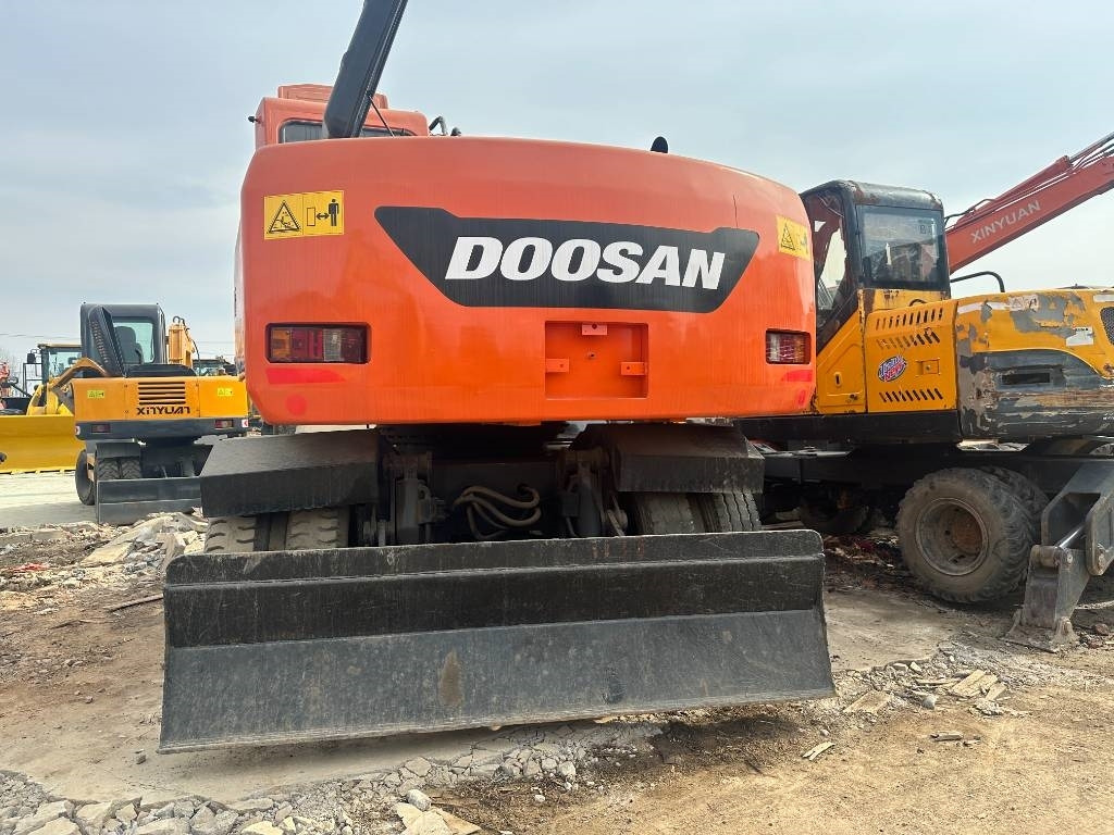 Doosan DH 150 W-7 - Bager na kotačima: slika Doosan DH 150 W-7 - Bager na kotačima Doosan DH 150 W-7 - Bager na kotačima: slika Doosan DH 150 W-7 - Bager na kotačima