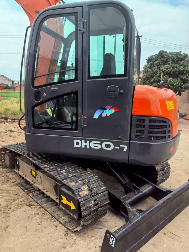 Doosan DH 60 - Mini bager: slika Doosan DH 60 - Mini bager Doosan DH 60 - Mini bager: slika Doosan DH 60 - Mini bager
