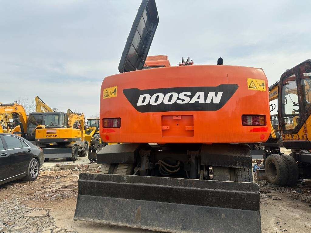 Doosan DX 150W -9 - Bager na kotačima: slika Doosan DX 150W -9 - Bager na kotačima Doosan DX 150W -9 - Bager na kotačima: slika Doosan DX 150W -9 - Bager na kotačima