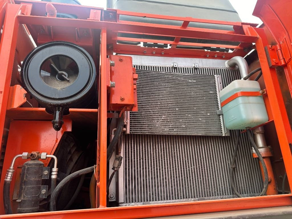 Bager na kotačima Doosan DX 150W -9: slika Bager na kotačima Doosan DX 150W -9 Bager na kotačima Doosan DX 150W -9: slika Bager na kotačima Doosan DX 150W -9