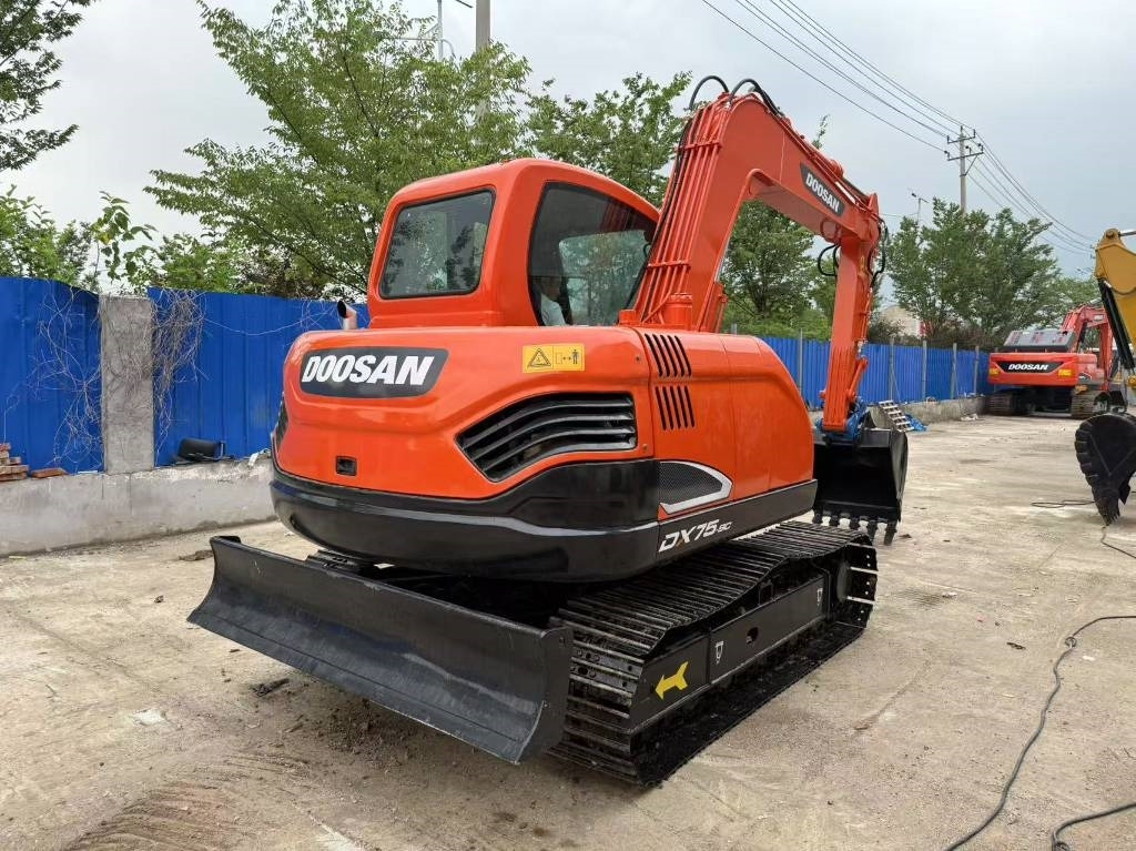 Doosan DX 75 - Bager gusjeničar: slika Doosan DX 75 - Bager gusjeničar Doosan DX 75 - Bager gusjeničar: slika Doosan DX 75 - Bager gusjeničar