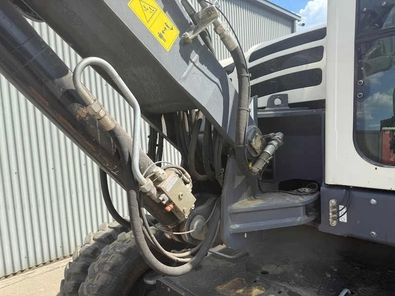 Terex TW 85 - Bager na kotačima: slika Terex TW 85 - Bager na kotačima Terex TW 85 - Bager na kotačima: slika Terex TW 85 - Bager na kotačima