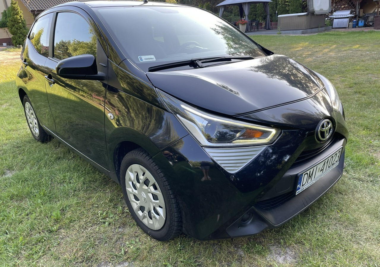 Toyota Aygo II Toyota Aygo 1.0-16V Klima Salon PL 24651km Model 2021 - Hatchback: slika Toyota Aygo II Toyota Aygo 1.0-16V Klima Salon PL 24651km Model 2021 - Hatchback Toyota Aygo II Toyota Aygo 1.0-16V Klima Salon PL 24651km Model 2021 - Hatchback: slika Toyota Aygo II Toyota Aygo 1.0-16V Klima Salon PL 24651km Model 2021 - Hatchback