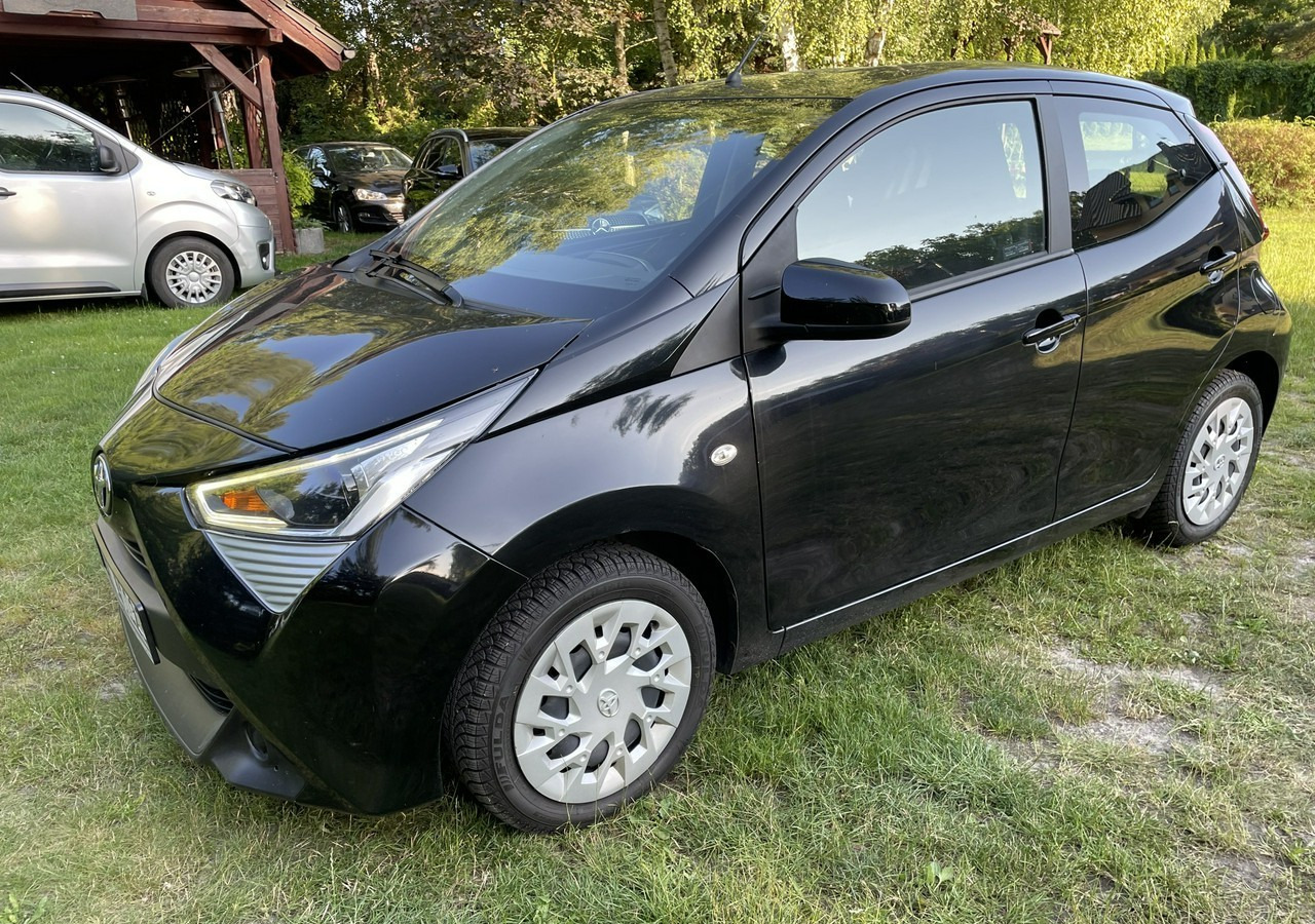 Toyota Aygo II Toyota Aygo 1.0-16V Klima Salon PL 24651km Model 2021 - Hatchback: slika Toyota Aygo II Toyota Aygo 1.0-16V Klima Salon PL 24651km Model 2021 - Hatchback Toyota Aygo II Toyota Aygo 1.0-16V Klima Salon PL 24651km Model 2021 - Hatchback: slika Toyota Aygo II Toyota Aygo 1.0-16V Klima Salon PL 24651km Model 2021 - Hatchback