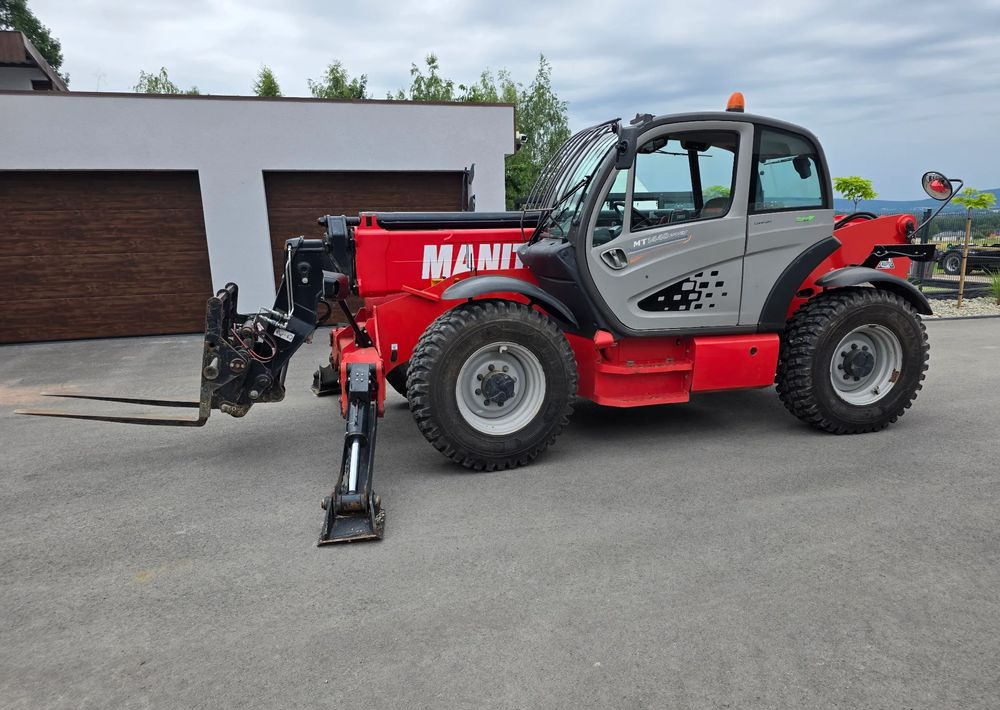 Manitou MT 1440 EASY - Teleskopski rukovatelj: slika Manitou MT 1440 EASY - Teleskopski rukovatelj Manitou MT 1440 EASY - Teleskopski rukovatelj: slika Manitou MT 1440 EASY - Teleskopski rukovatelj