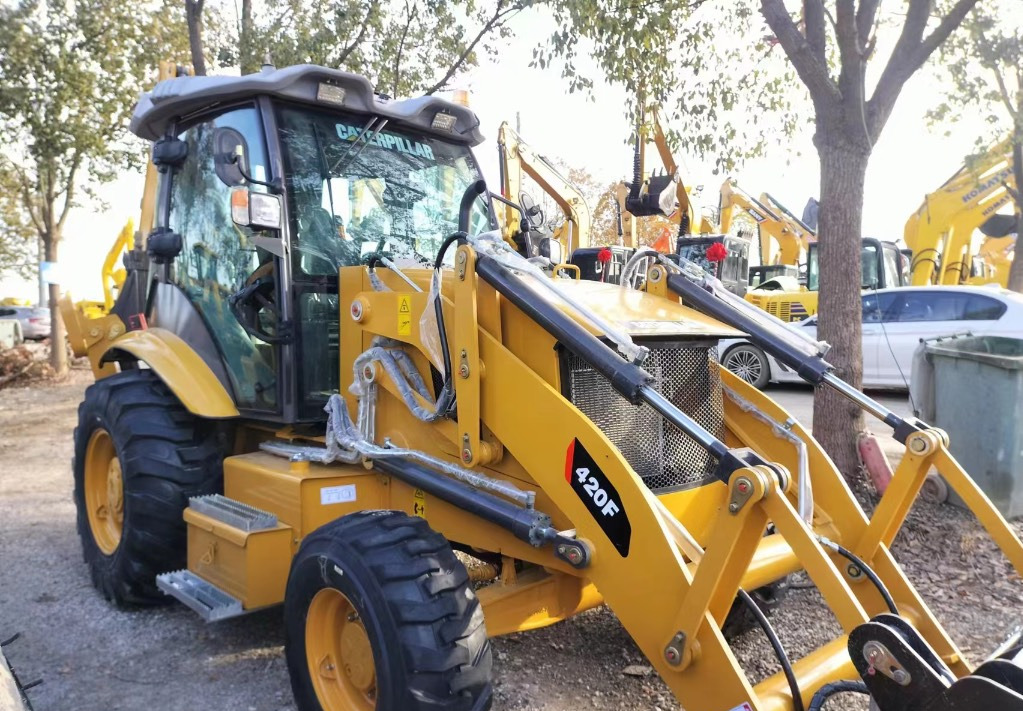 Rovokopač-utovarivač CAT 420 F Caterpillar 420F backhoe loader: slika Rovokopač-utovarivač CAT 420 F Caterpillar 420F backhoe loader