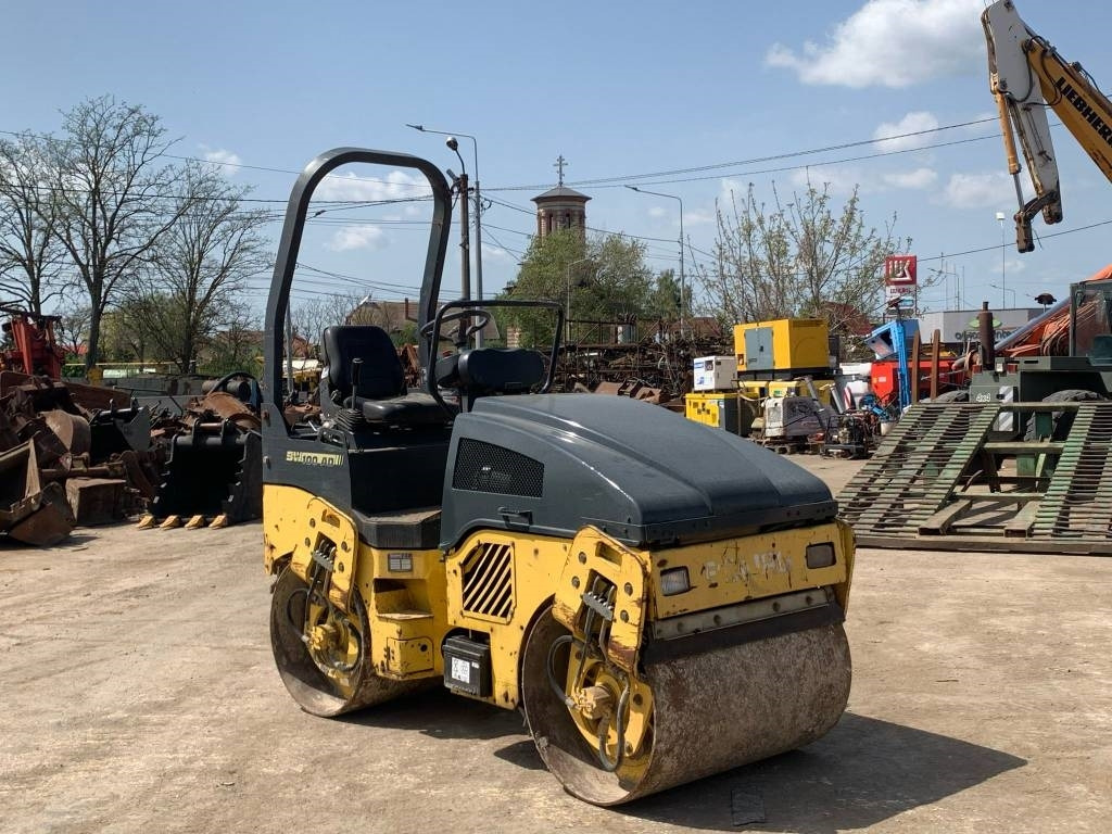 Bomag BW 100 AD-4 - Cestovni valjak: slika Bomag BW 100 AD-4 - Cestovni valjak Bomag BW 100 AD-4 - Cestovni valjak: slika Bomag BW 100 AD-4 - Cestovni valjak