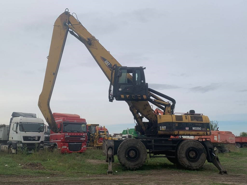 CAT M 325 C L MH - Stroj za rukovanje otpadom: slika CAT M 325 C L MH - Stroj za rukovanje otpadom CAT M 325 C L MH - Stroj za rukovanje otpadom: slika CAT M 325 C L MH - Stroj za rukovanje otpadom