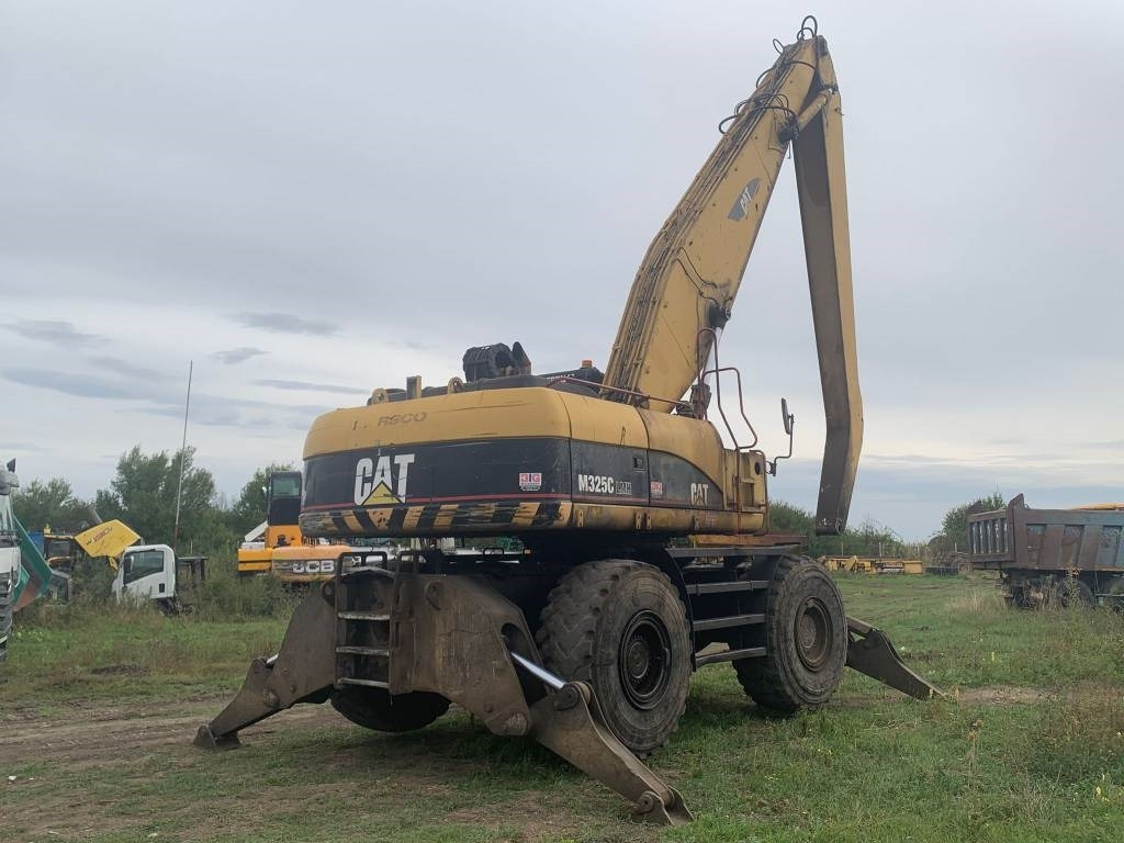 CAT M 325 C L MH - Stroj za rukovanje otpadom: slika CAT M 325 C L MH - Stroj za rukovanje otpadom CAT M 325 C L MH - Stroj za rukovanje otpadom: slika CAT M 325 C L MH - Stroj za rukovanje otpadom