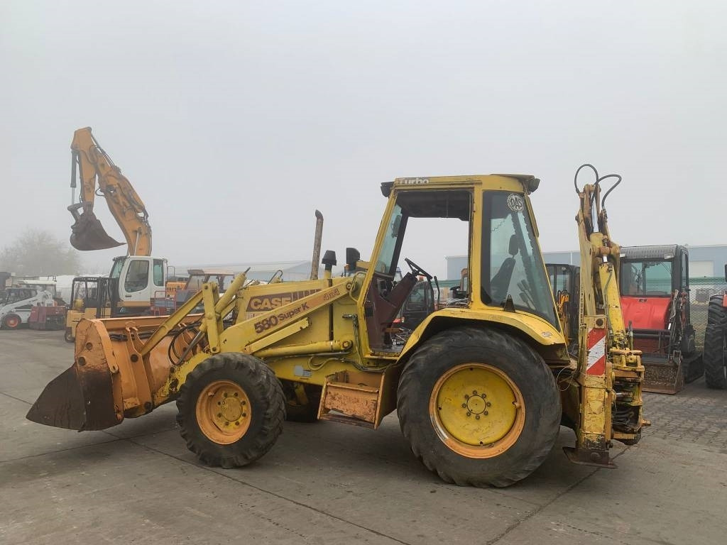 Case 580 K - Rovokopač-utovarivač: slika Case 580 K - Rovokopač-utovarivač Case 580 K - Rovokopač-utovarivač: slika Case 580 K - Rovokopač-utovarivač