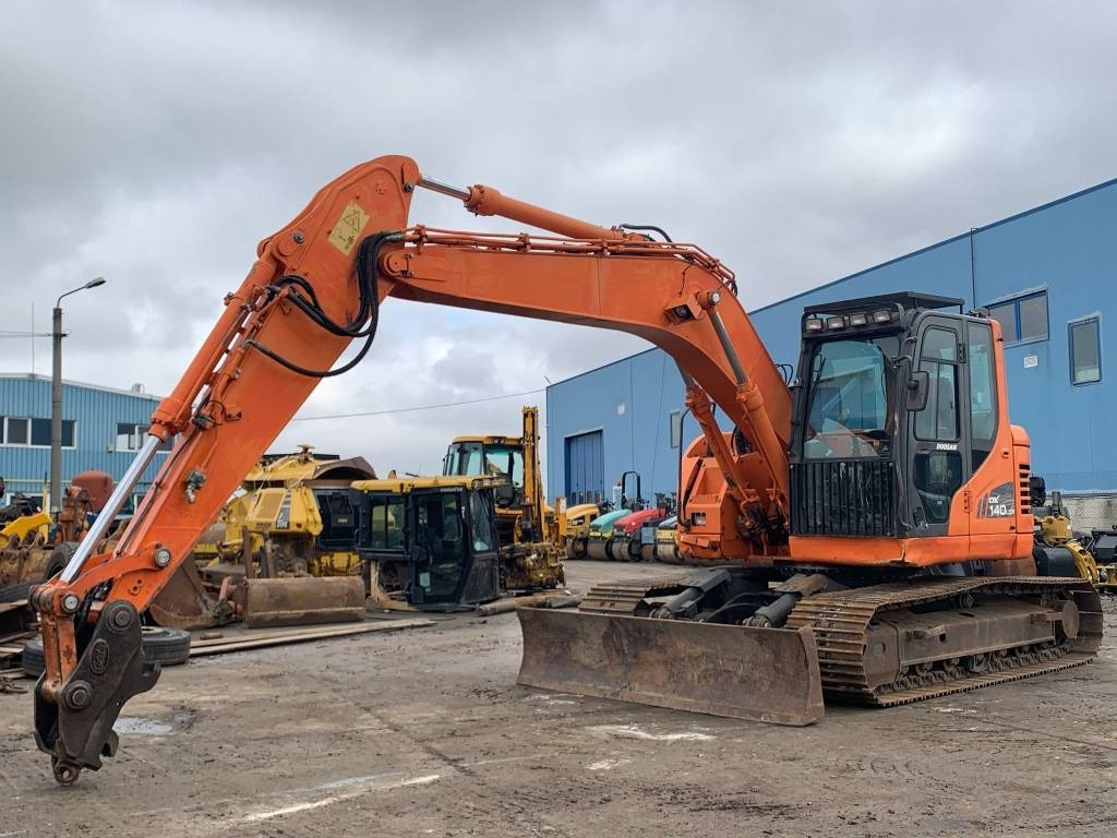 Doosan DX 140 LCR - Bager gusjeničar: slika Doosan DX 140 LCR - Bager gusjeničar Doosan DX 140 LCR - Bager gusjeničar: slika Doosan DX 140 LCR - Bager gusjeničar