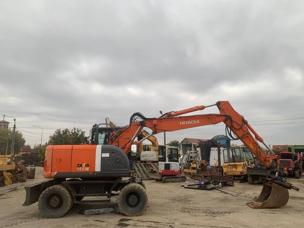 Hitachi ZX 145 W-3+SMP Rototilt - Bager na kotačima: slika Hitachi ZX 145 W-3+SMP Rototilt - Bager na kotačima Hitachi ZX 145 W-3+SMP Rototilt - Bager na kotačima: slika Hitachi ZX 145 W-3+SMP Rototilt - Bager na kotačima
