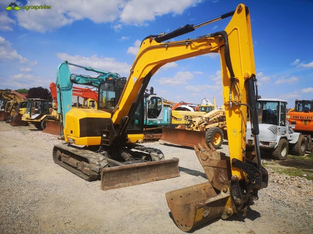 JCB 100 C - Mini bager: slika JCB 100 C - Mini bager JCB 100 C - Mini bager: slika JCB 100 C - Mini bager