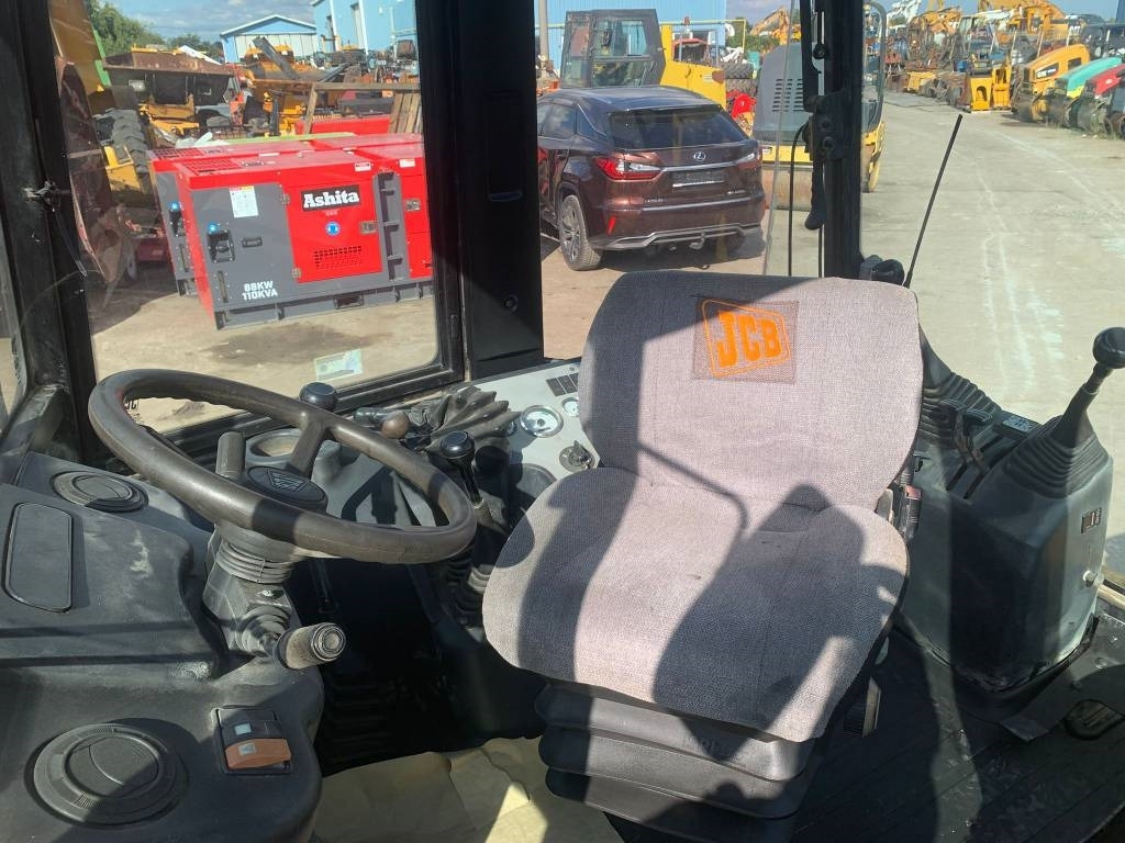 Rovokopač-utovarivač JCB 2 CX: slika Rovokopač-utovarivač JCB 2 CX Rovokopač-utovarivač JCB 2 CX: slika Rovokopač-utovarivač JCB 2 CX