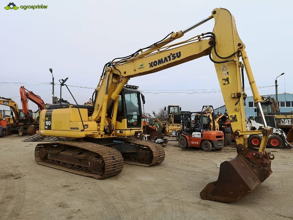 Komatsu PC180LC-7K - Bager gusjeničar: slika Komatsu PC180LC-7K - Bager gusjeničar Komatsu PC180LC-7K - Bager gusjeničar: slika Komatsu PC180LC-7K - Bager gusjeničar