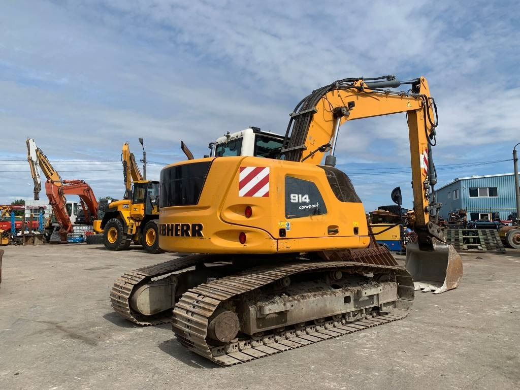 Liebherr R 914 Compact Litronic - Bager na kotačima: slika Liebherr R 914 Compact Litronic - Bager na kotačima Liebherr R 914 Compact Litronic - Bager na kotačima: slika Liebherr R 914 Compact Litronic - Bager na kotačima