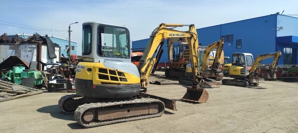 New Holland E 50.2 C - Mini bager: slika New Holland E 50.2 C - Mini bager New Holland E 50.2 C - Mini bager: slika New Holland E 50.2 C - Mini bager