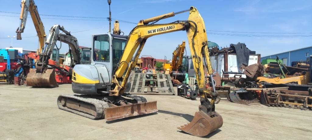 New Holland E 50.2 C - Mini bager: slika New Holland E 50.2 C - Mini bager New Holland E 50.2 C - Mini bager: slika New Holland E 50.2 C - Mini bager
