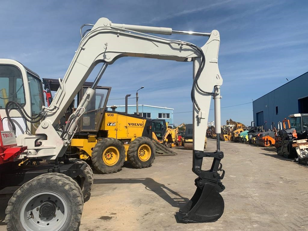 Takeuchi TB070W - Bager na kotačima: slika Takeuchi TB070W - Bager na kotačima Takeuchi TB070W - Bager na kotačima: slika Takeuchi TB070W - Bager na kotačima