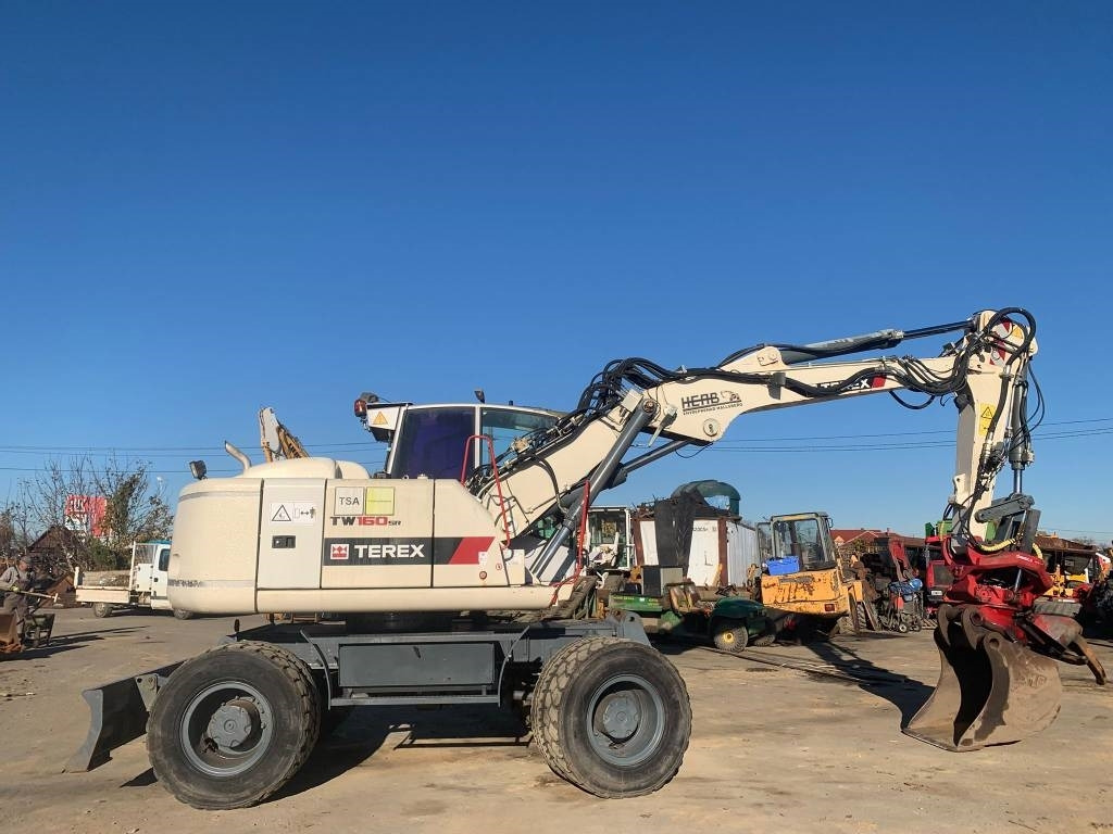 Terex TW160SR+Sandco Rototilt - Bager na kotačima: slika Terex TW160SR+Sandco Rototilt - Bager na kotačima Terex TW160SR+Sandco Rototilt - Bager na kotačima: slika Terex TW160SR+Sandco Rototilt - Bager na kotačima