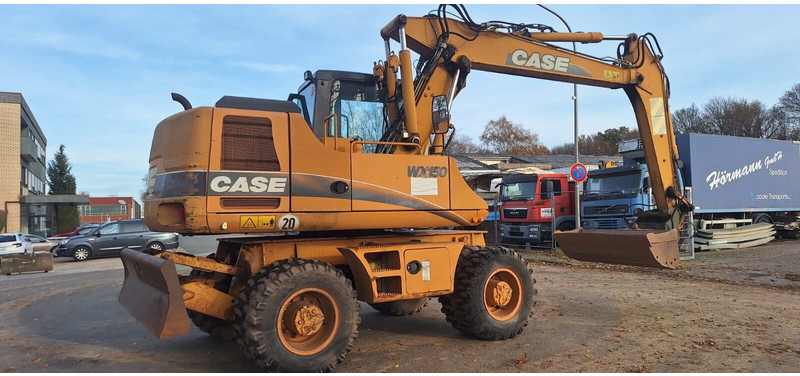 Case WX150 - Bager na kotačima: slika Case WX150 - Bager na kotačima Case WX150 - Bager na kotačima: slika Case WX150 - Bager na kotačima