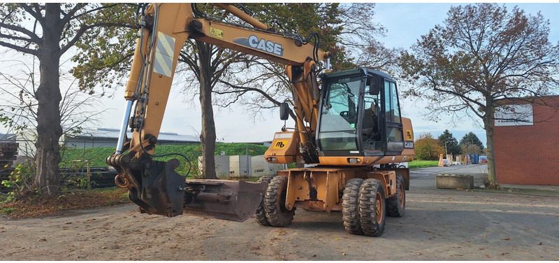 Case WX150 - Bager na kotačima: slika Case WX150 - Bager na kotačima Case WX150 - Bager na kotačima: slika Case WX150 - Bager na kotačima