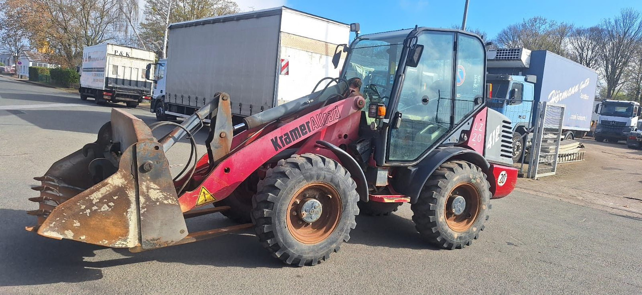 Kramer 418 Radlader 4x4 - Utovarivač na kotačima: slika Kramer 418 Radlader 4x4 - Utovarivač na kotačima Kramer 418 Radlader 4x4 - Utovarivač na kotačima: slika Kramer 418 Radlader 4x4 - Utovarivač na kotačima