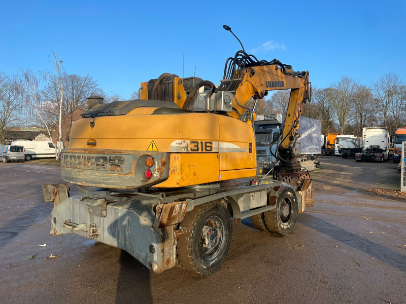 Liebherr A 316 - Stroj za rukovanje otpadom: slika Liebherr A 316 - Stroj za rukovanje otpadom Liebherr A 316 - Stroj za rukovanje otpadom: slika Liebherr A 316 - Stroj za rukovanje otpadom