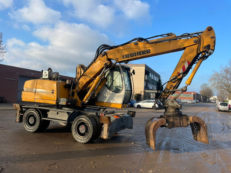 Liebherr A 316 - Stroj za rukovanje otpadom: slika Liebherr A 316 - Stroj za rukovanje otpadom Liebherr A 316 - Stroj za rukovanje otpadom: slika Liebherr A 316 - Stroj za rukovanje otpadom