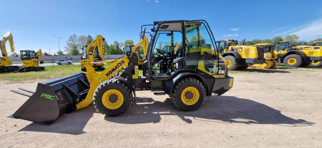 Komatsu WA 70 - Utovarivač na kotačima: slika Komatsu WA 70 - Utovarivač na kotačima Komatsu WA 70 - Utovarivač na kotačima: slika Komatsu WA 70 - Utovarivač na kotačima