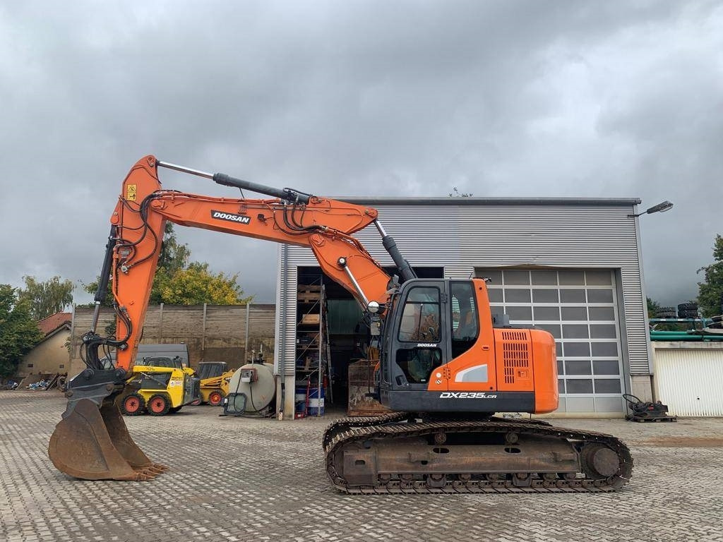 Doosan DX 235 LCR-5 - Bager gusjeničar: slika Doosan DX 235 LCR-5 - Bager gusjeničar Doosan DX 235 LCR-5 - Bager gusjeničar: slika Doosan DX 235 LCR-5 - Bager gusjeničar