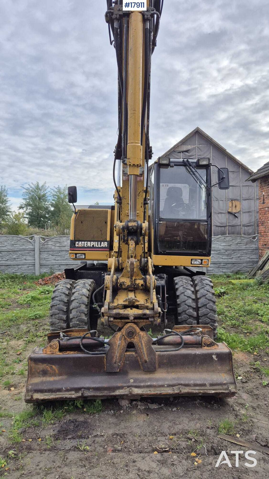 2000 CAT M312 - Bager na kotačima: slika 2000 CAT M312 - Bager na kotačima 2000 CAT M312 - Bager na kotačima: slika 2000 CAT M312 - Bager na kotačima