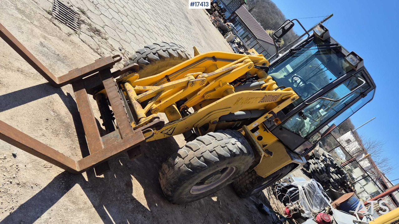 Wheel loader AHLMANN AL 85t 2004) forks, quick coupler, opening bucket. - Utovarivač na kotačima: slika Wheel loader AHLMANN AL 85t 2004) forks, quick coupler, opening bucket. - Utovarivač na kotačima Wheel loader AHLMANN AL 85t 2004) forks, quick coupler, opening bucket. - Utovarivač na kotačima: slika Wheel loader AHLMANN AL 85t 2004) forks, quick coupler, opening bucket. - Utovarivač na kotačima