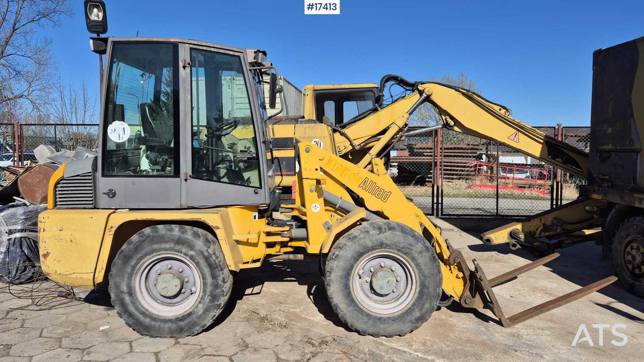Wheel loader AHLMANN AL 85t 2004) forks, quick coupler, opening bucket. - Utovarivač na kotačima: slika Wheel loader AHLMANN AL 85t 2004) forks, quick coupler, opening bucket. - Utovarivač na kotačima Wheel loader AHLMANN AL 85t 2004) forks, quick coupler, opening bucket. - Utovarivač na kotačima: slika Wheel loader AHLMANN AL 85t 2004) forks, quick coupler, opening bucket. - Utovarivač na kotačima