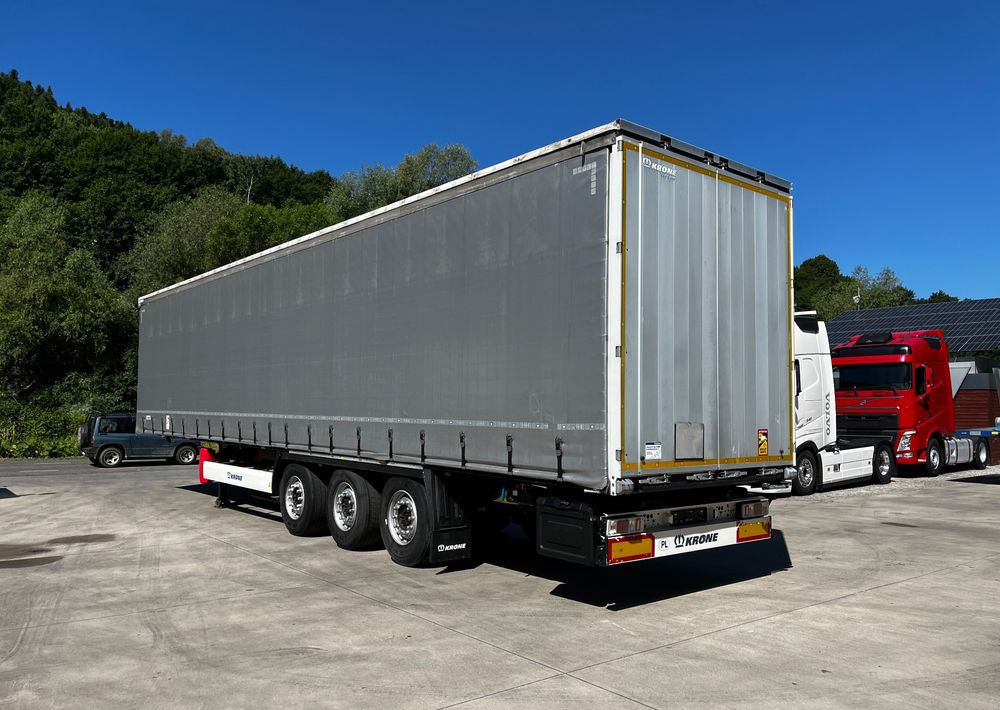 Krone Firanka Coilmulde // 9m // Alu Drzwi // Ażury // Oś podnoszona // - Poluprikolica s ceradom: slika Krone Firanka Coilmulde // 9m // Alu Drzwi // Ażury // Oś podnoszona // - Poluprikolica s ceradom Krone Firanka Coilmulde // 9m // Alu Drzwi // Ażury // Oś podnoszona // - Poluprikolica s ceradom: slika Krone Firanka Coilmulde // 9m // Alu Drzwi // Ażury // Oś podnoszona // - Poluprikolica s ceradom