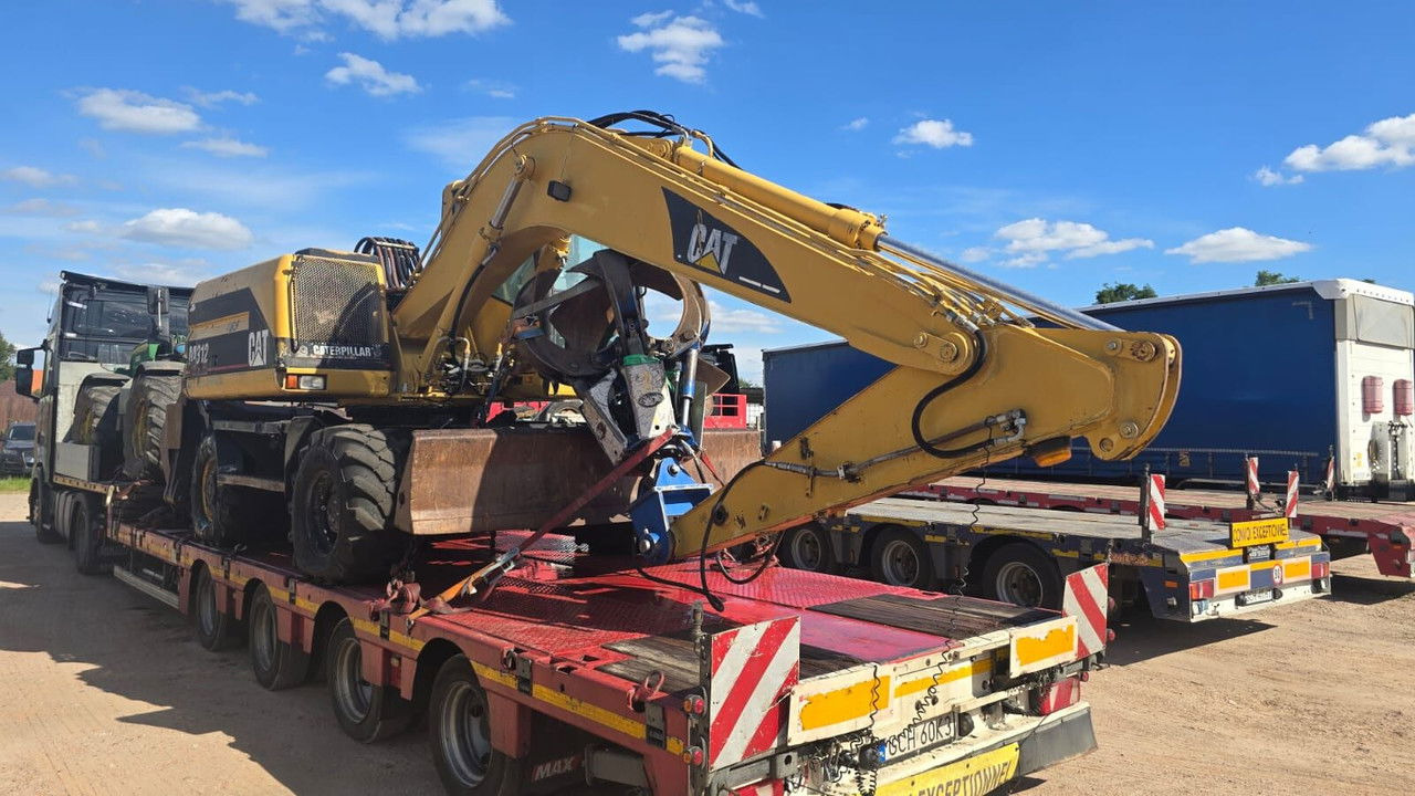 Caterpillar M312 Koparka PrzeŁAdunkowa Czerpak Świeżo Sprowadz ona - Bager na kotačima: slika Caterpillar M312 Koparka PrzeŁAdunkowa Czerpak Świeżo Sprowadz ona - Bager na kotačima Caterpillar M312 Koparka PrzeŁAdunkowa Czerpak Świeżo Sprowadz ona - Bager na kotačima: slika Caterpillar M312 Koparka PrzeŁAdunkowa Czerpak Świeżo Sprowadz ona - Bager na kotačima