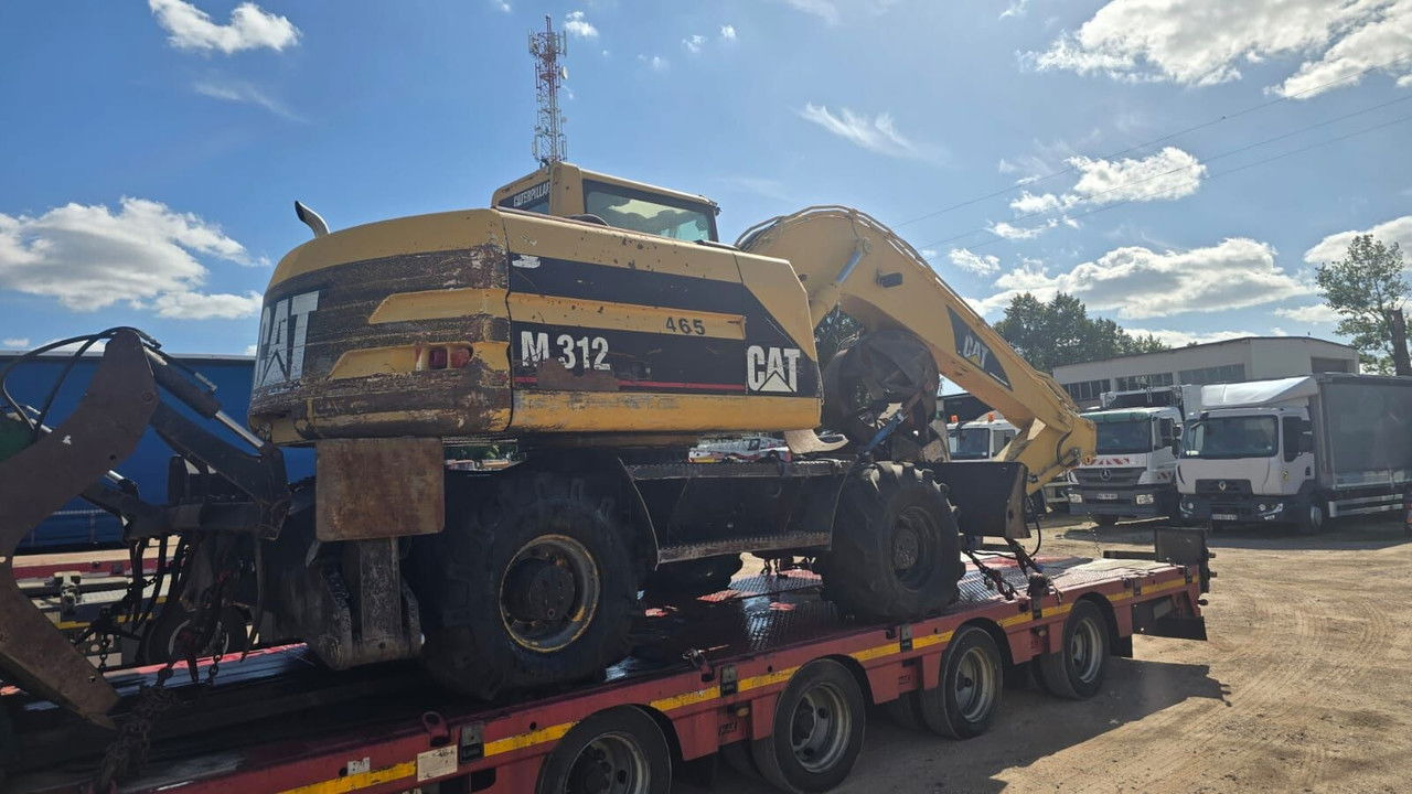 Caterpillar M312 Koparka PrzeŁAdunkowa Czerpak Świeżo Sprowadz ona - Bager na kotačima: slika Caterpillar M312 Koparka PrzeŁAdunkowa Czerpak Świeżo Sprowadz ona - Bager na kotačima Caterpillar M312 Koparka PrzeŁAdunkowa Czerpak Świeżo Sprowadz ona - Bager na kotačima: slika Caterpillar M312 Koparka PrzeŁAdunkowa Czerpak Świeżo Sprowadz ona - Bager na kotačima