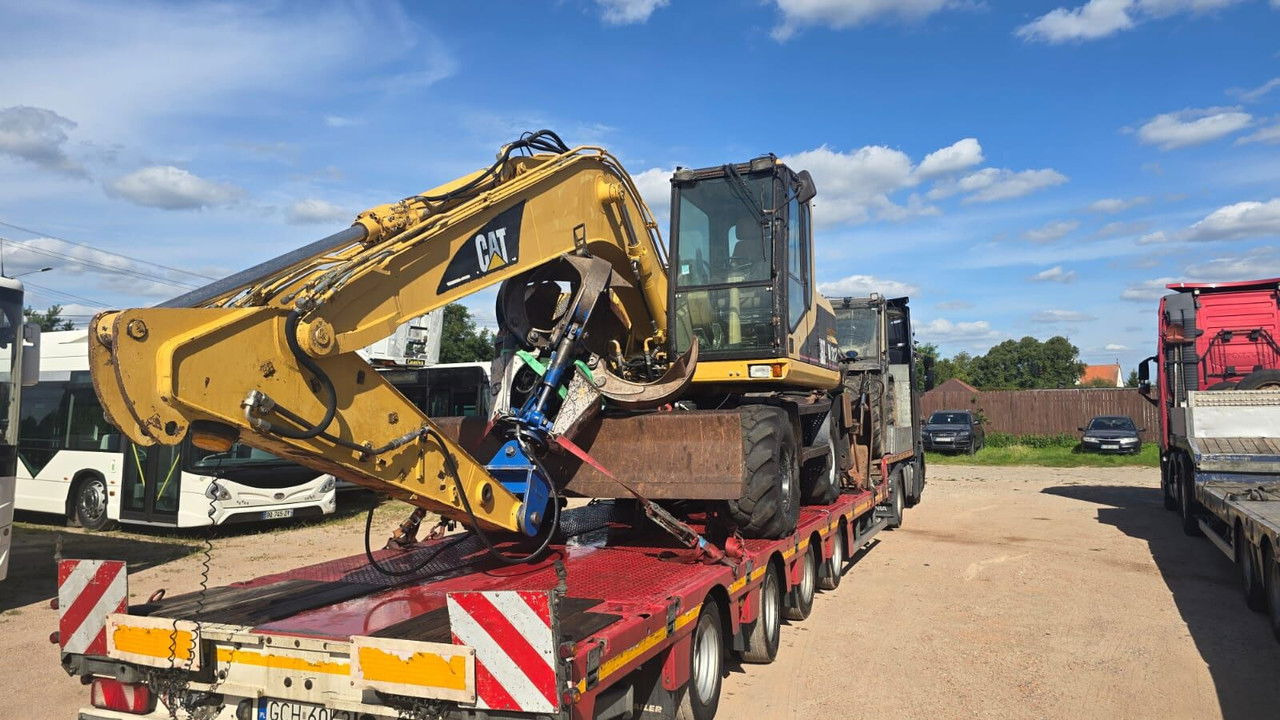 Caterpillar M312 Koparka PrzeŁAdunkowa Czerpak Świeżo Sprowadz ona - Bager na kotačima: slika Caterpillar M312 Koparka PrzeŁAdunkowa Czerpak Świeżo Sprowadz ona - Bager na kotačima Caterpillar M312 Koparka PrzeŁAdunkowa Czerpak Świeżo Sprowadz ona - Bager na kotačima: slika Caterpillar M312 Koparka PrzeŁAdunkowa Czerpak Świeżo Sprowadz ona - Bager na kotačima
