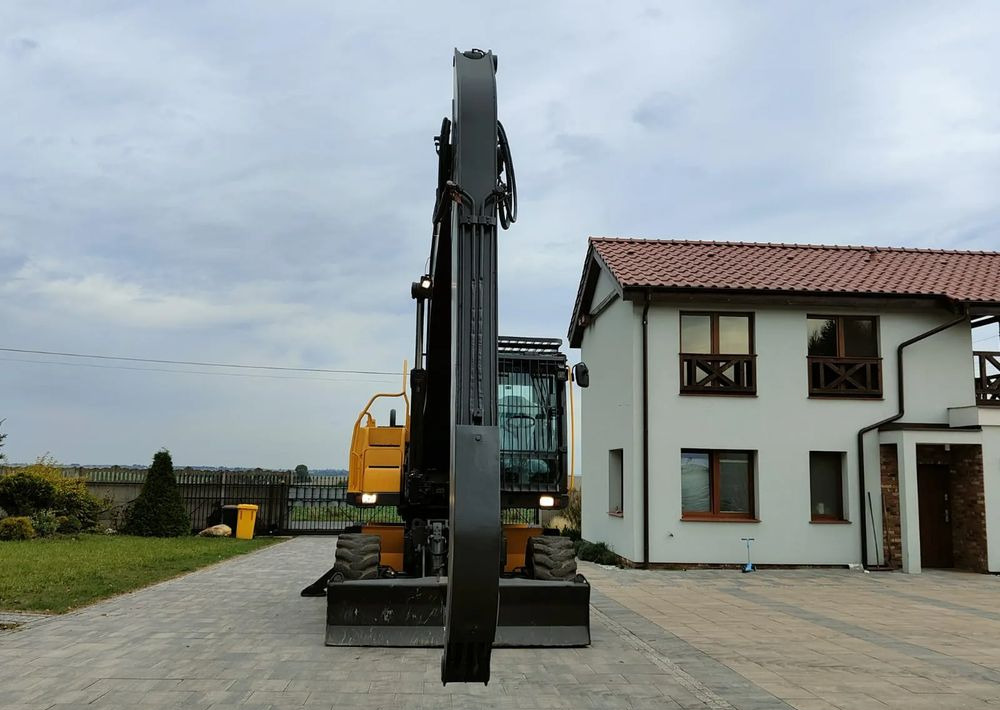 Volvo EW180C - Bager na kotačima: slika Volvo EW180C - Bager na kotačima Volvo EW180C - Bager na kotačima: slika Volvo EW180C - Bager na kotačima