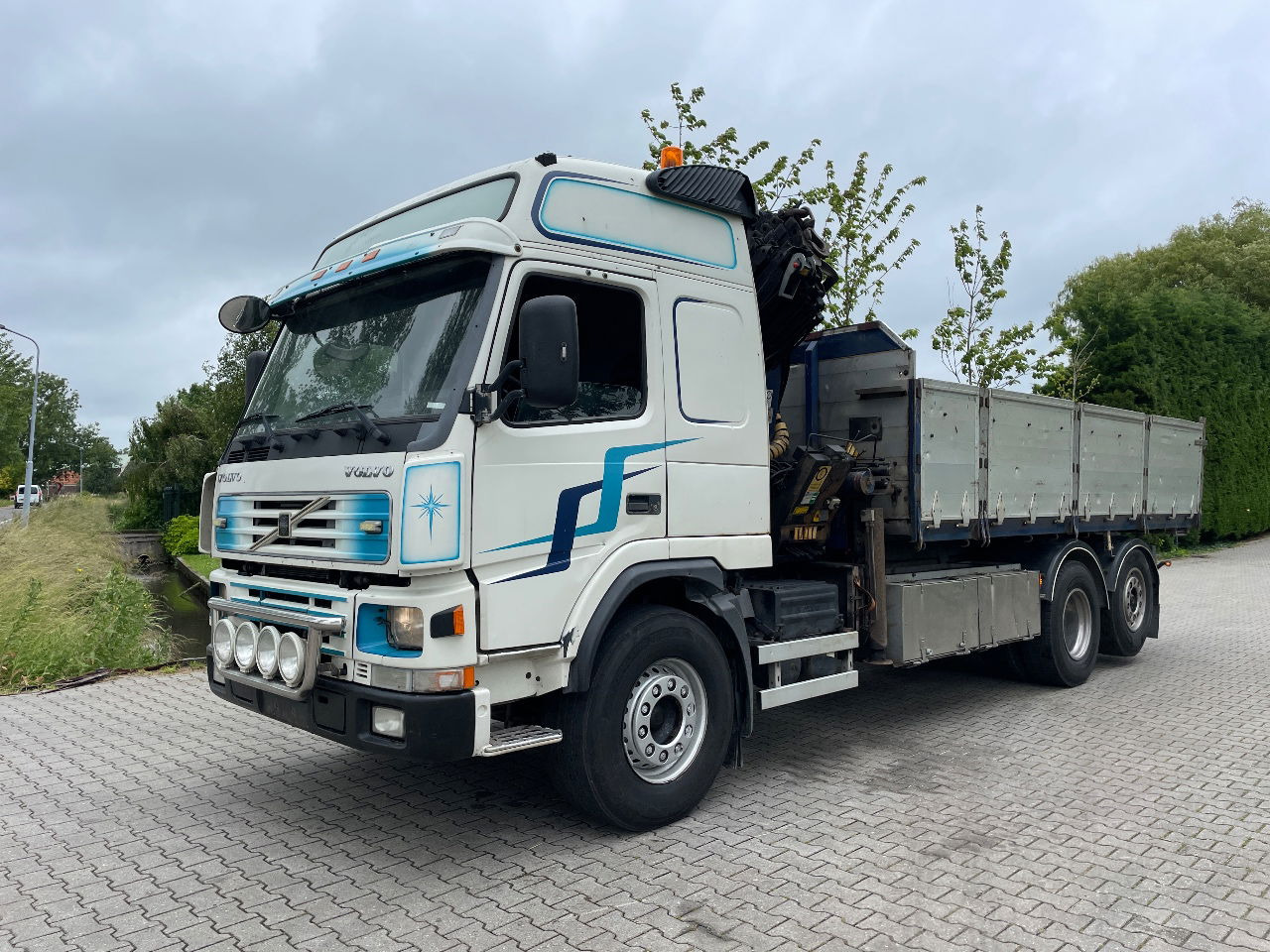 Volvo FM 7 310hp with Palfinger PK21000 with remote and tipper - Kiper, Kamion s kranom: slika Volvo FM 7 310hp with Palfinger PK21000 with remote and tipper - Kiper, Kamion s kranom Volvo FM 7 310hp with Palfinger PK21000 with remote and tipper - Kiper, Kamion s kranom: slika Volvo FM 7 310hp with Palfinger PK21000 with remote and tipper - Kiper, Kamion s kranom