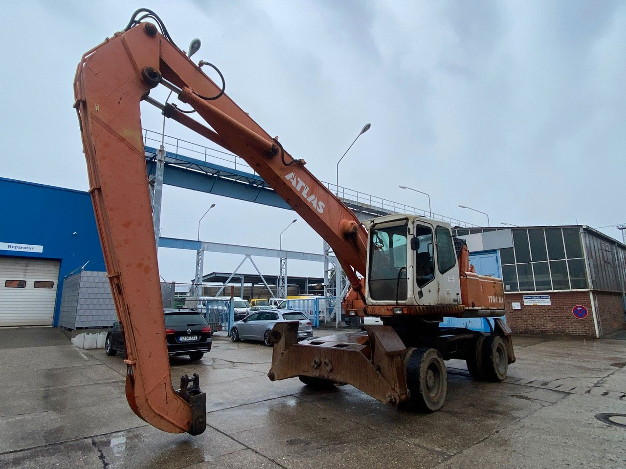 Atlas 1704 MI mit Greifer Umschlagbagger Lang - Bager na kotačima: slika Atlas 1704 MI mit Greifer Umschlagbagger Lang - Bager na kotačima Atlas 1704 MI mit Greifer Umschlagbagger Lang - Bager na kotačima: slika Atlas 1704 MI mit Greifer Umschlagbagger Lang - Bager na kotačima